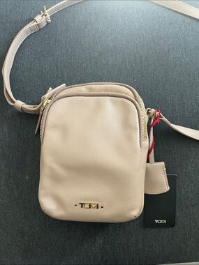 Tumi Neutral Beige Leather Kathryn Crossbody Phone Pouch with Gold Hardware